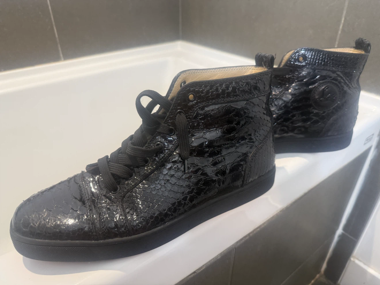 Christian Louboutin black python high top sneakers