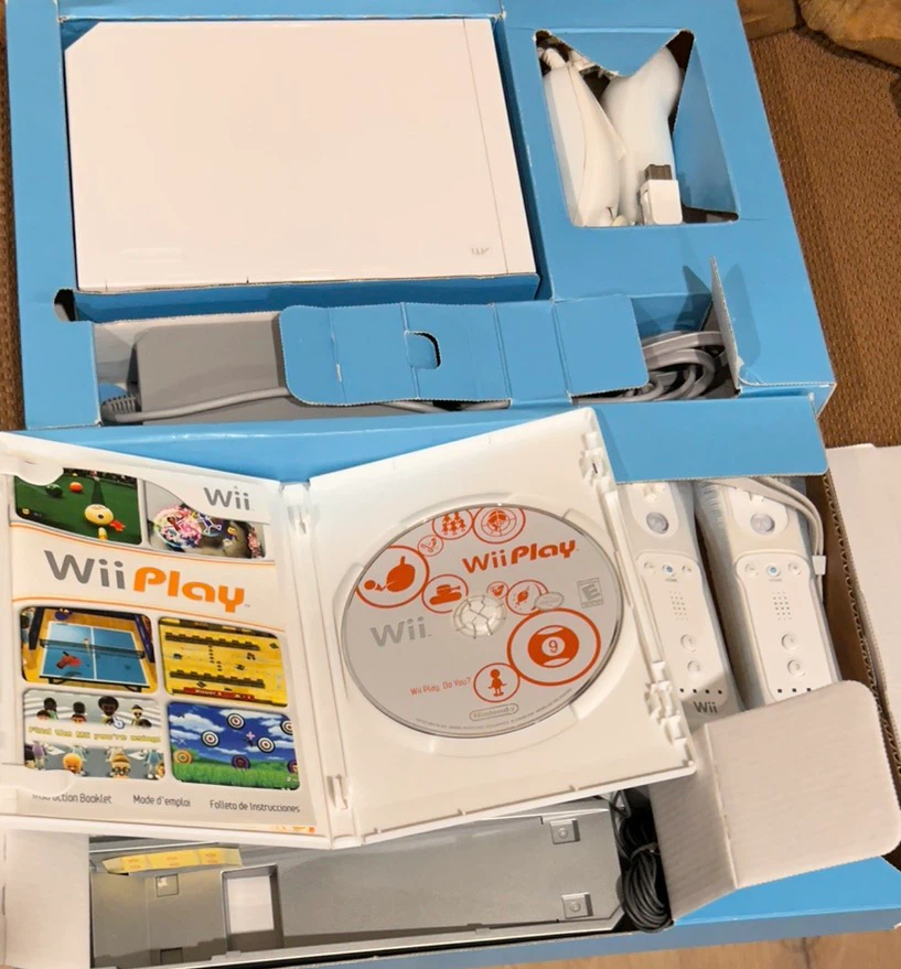 Wii Console and Wii Play game +Wii fit Console and Game