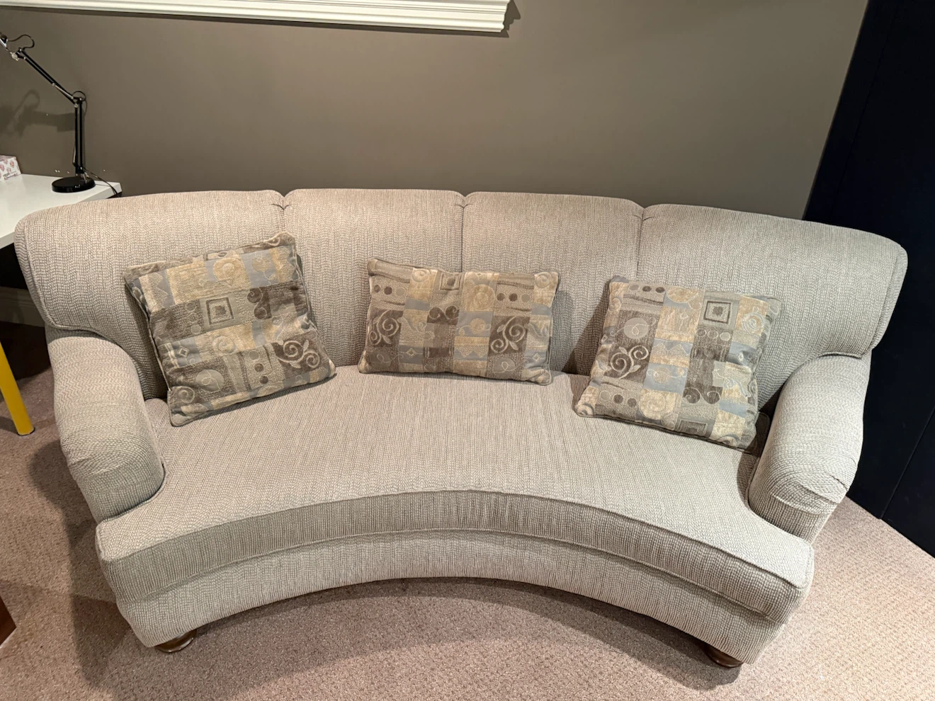 Curved Sofa with Decorative Pillows