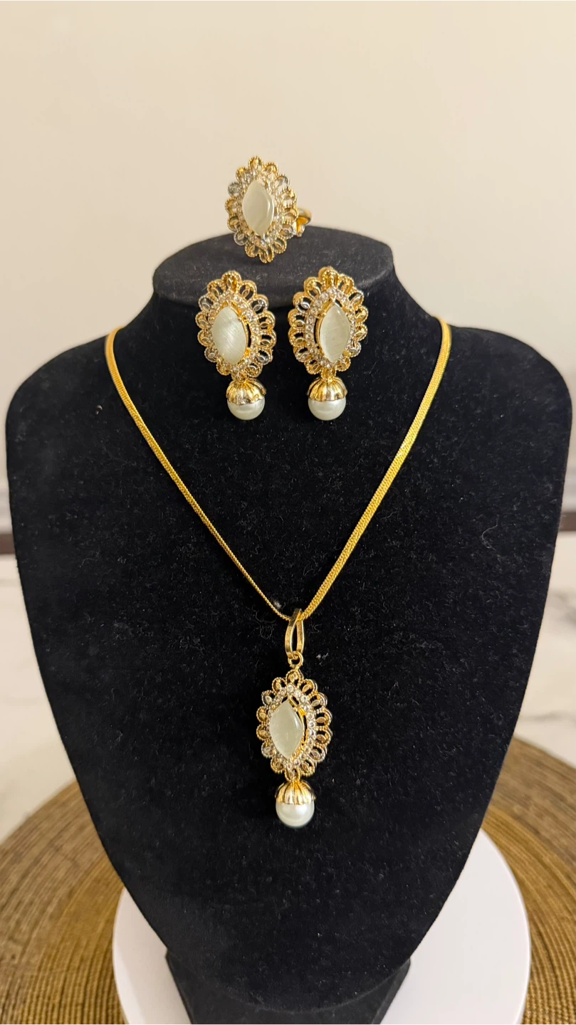 Gold Tone Necklace, Earrings, and Ring Set with White Stones