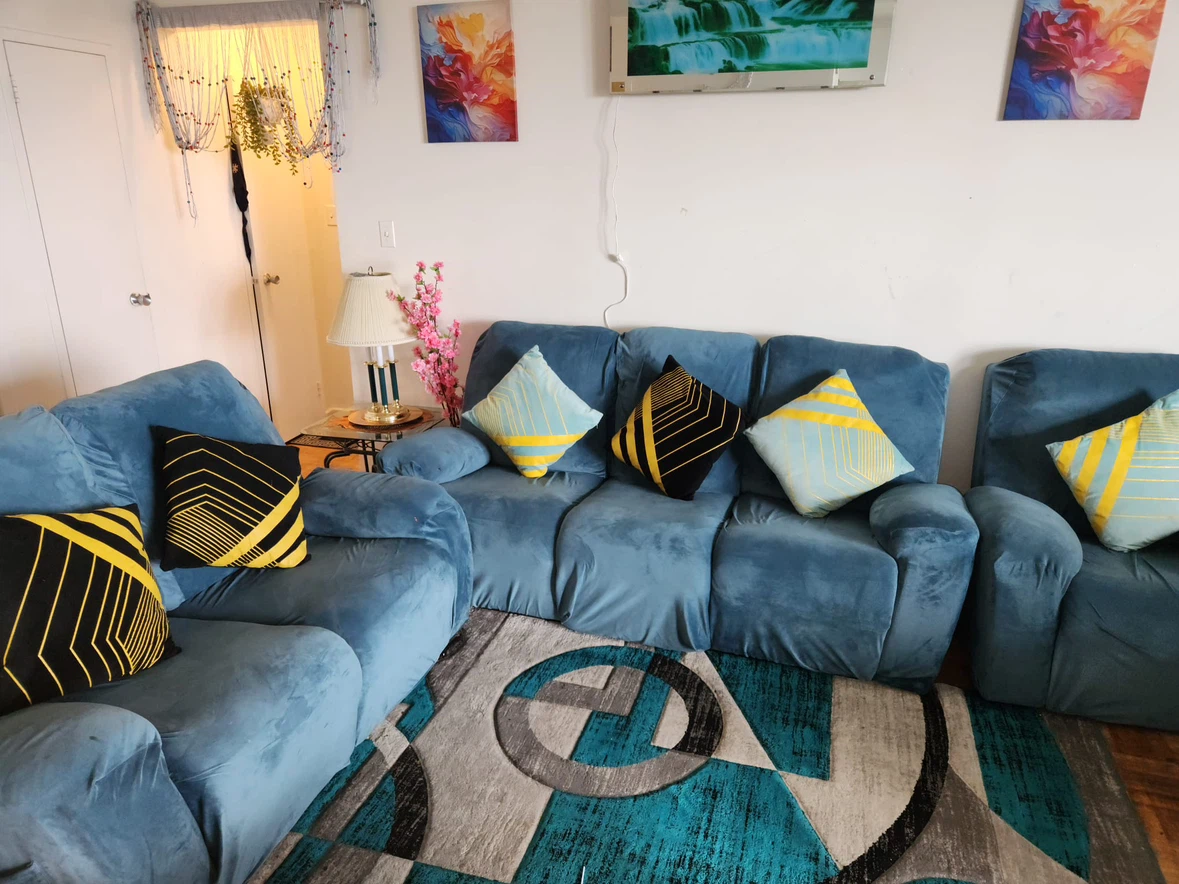 Blue reclining sofa set