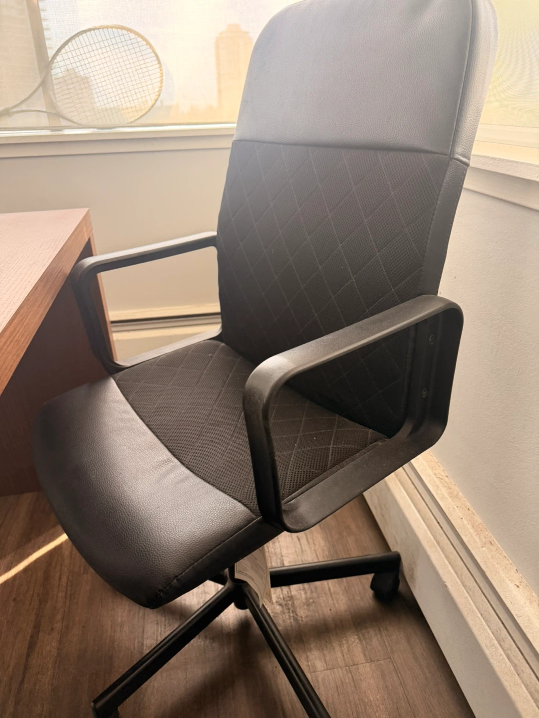 Black diamond-patterned rotating office chair