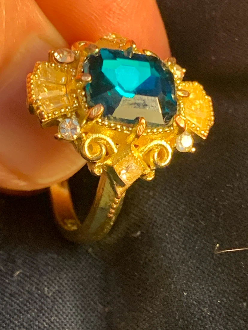 Gold-toned 925 sterling silver ring with blue stone
