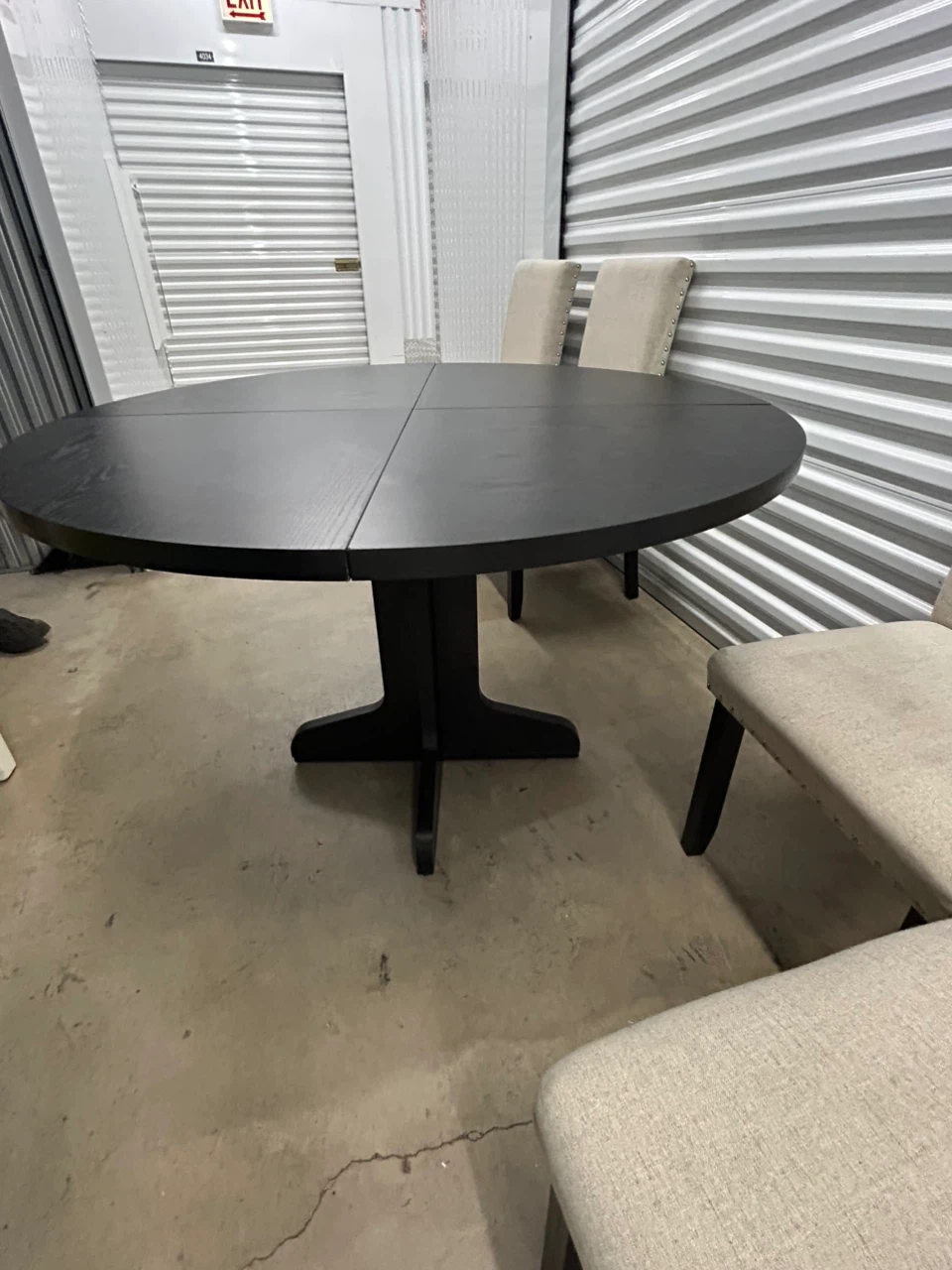 Round Black Dining Table with 4 Beige Upholstered Chairs - photo 3