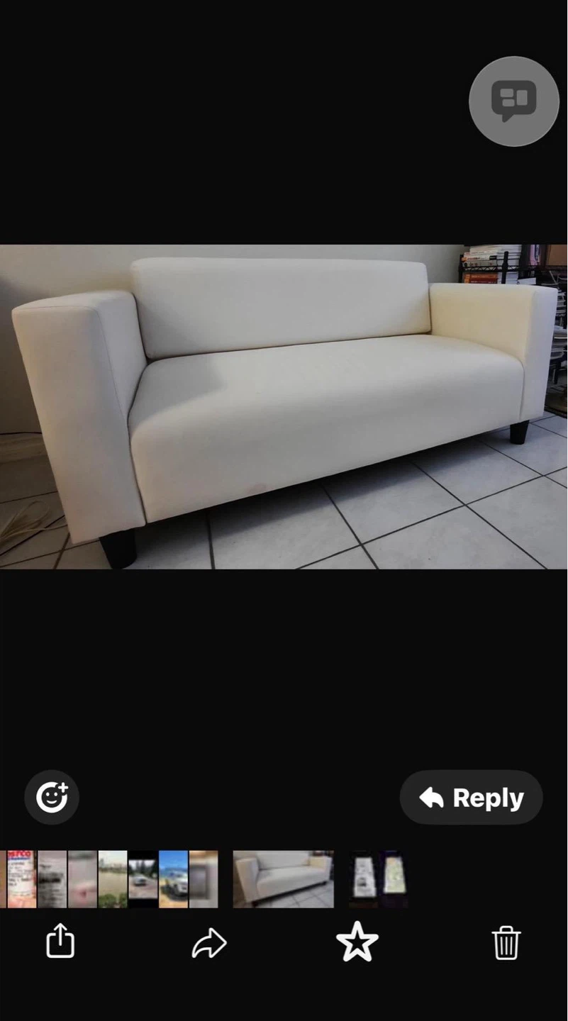 White fabric two-seater sofa