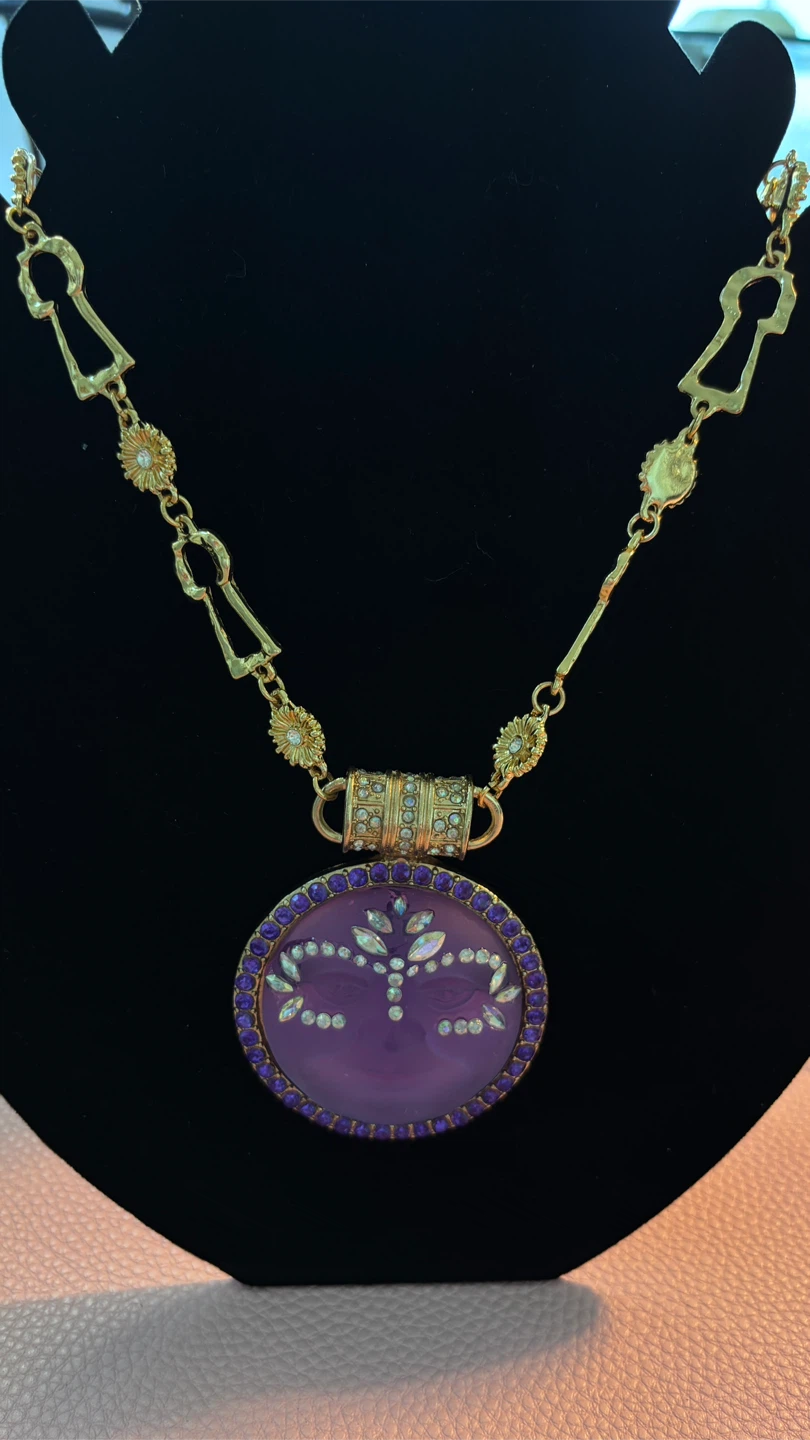 Purple moon face pendant necklace