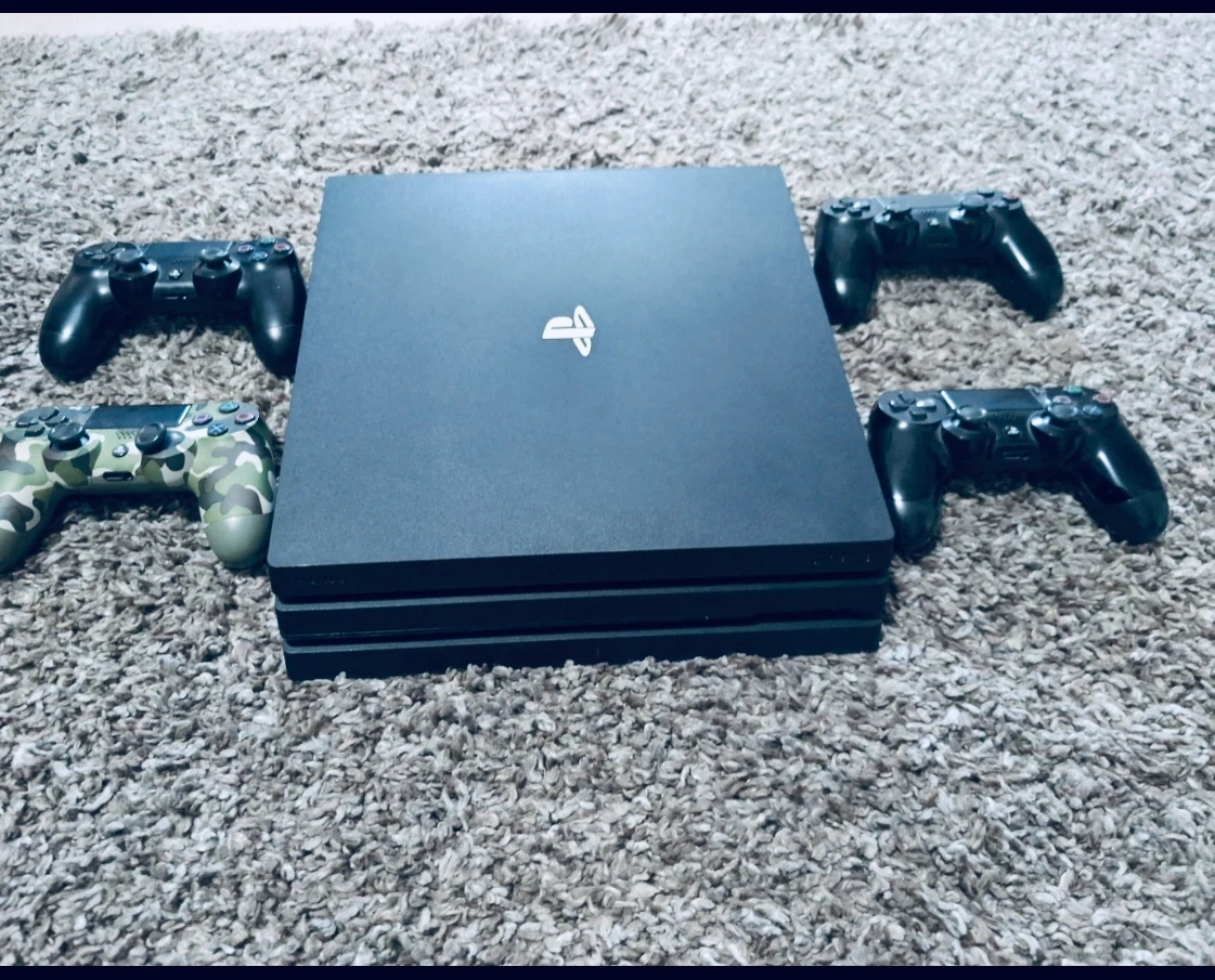 Sony PlayStation 4 Pro Console with 4 Controllers