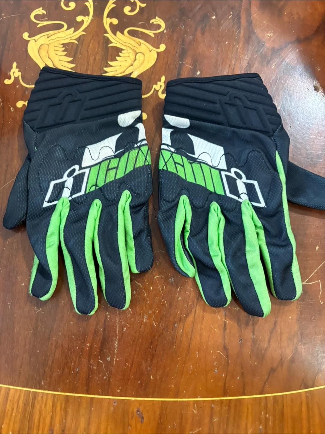 Icon D3O motorcycle gloves in black and green