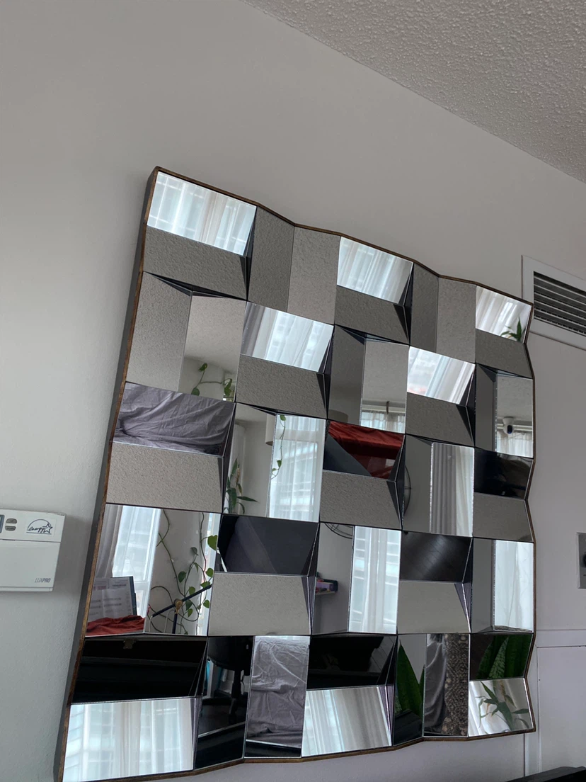 Geometric angled wall mirror
