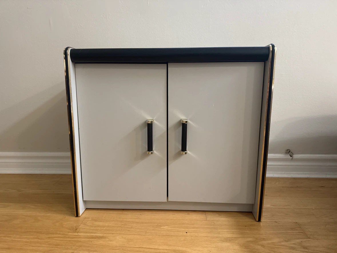 White and black two-door storage cabinet