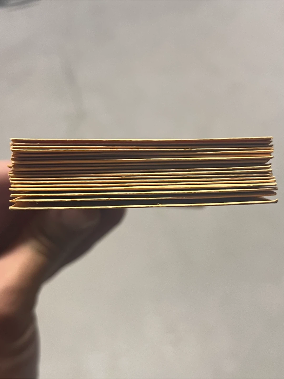 Stack of small yellow paper envelopes - photo 2