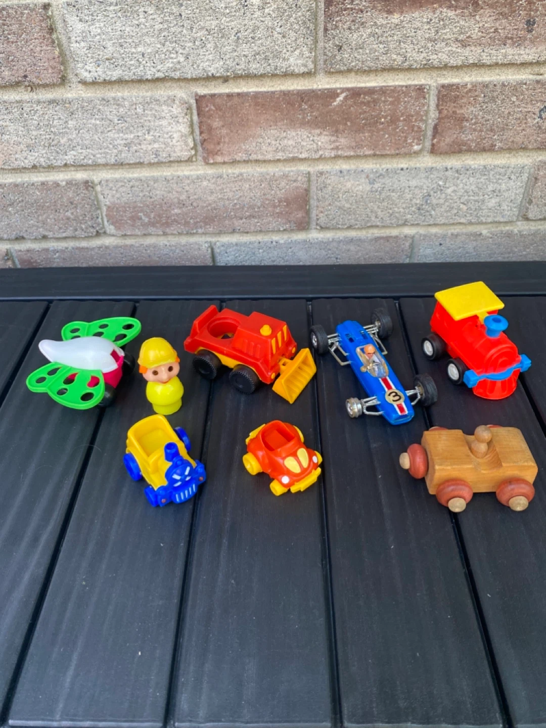 Vintage Assorted toy vehicle and figurine set