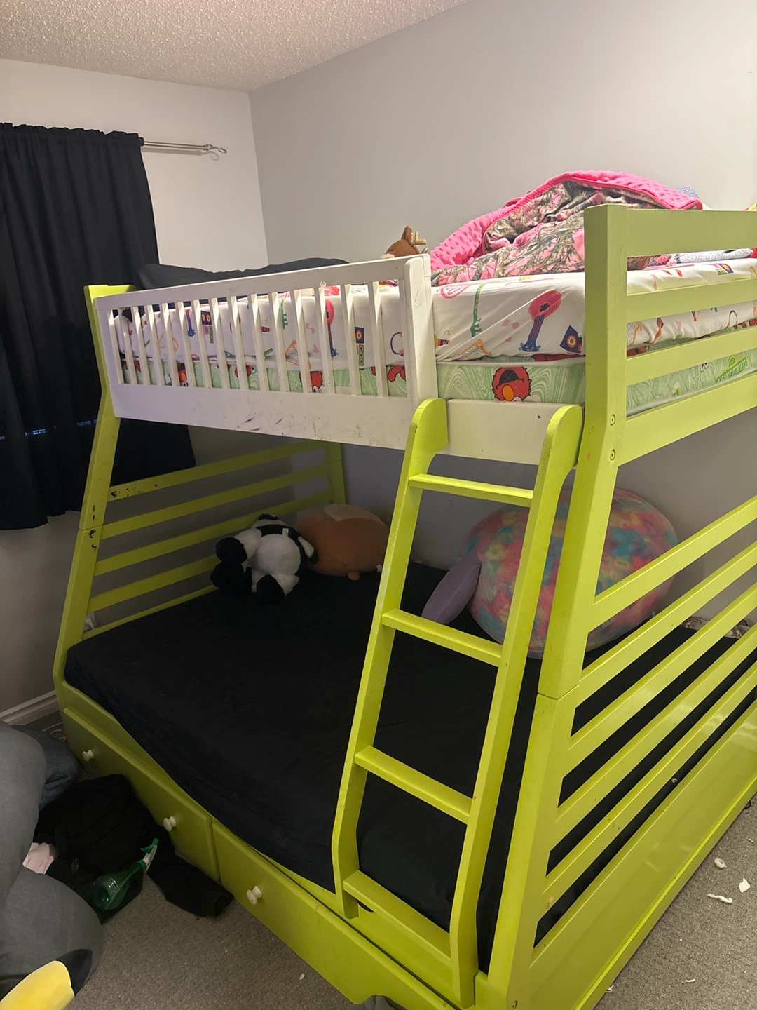 Lime green wooden bunk bed with storage drawers