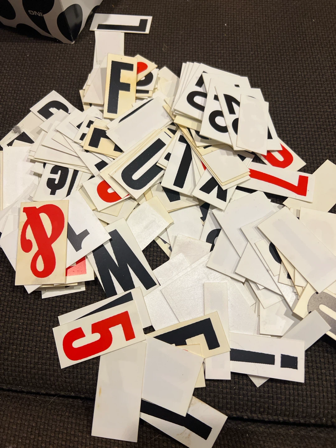 Assorted white vinyl letters and numbers