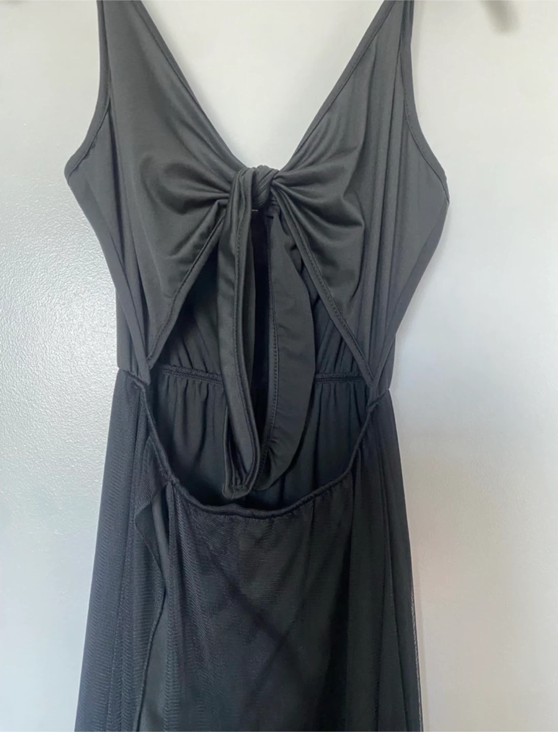 Black sleeveless romper with sheer skirt - photo 2