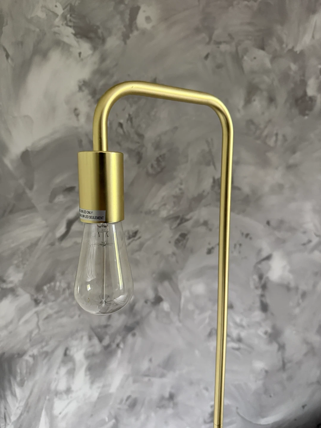 Minimalist gold floor lamp
