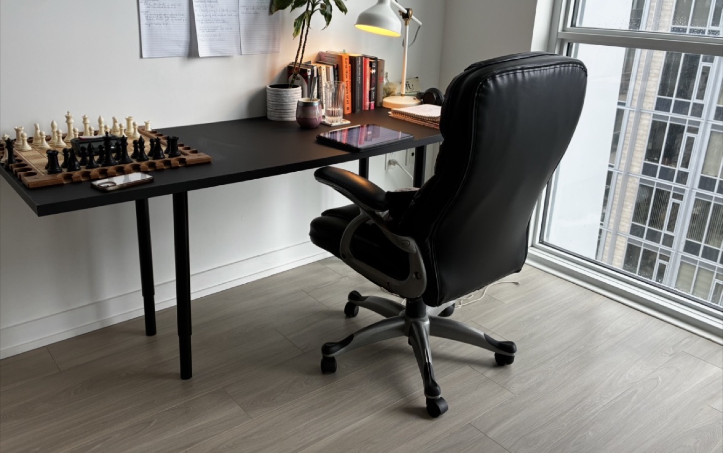 Black Executive Office Chair and IKEA desk