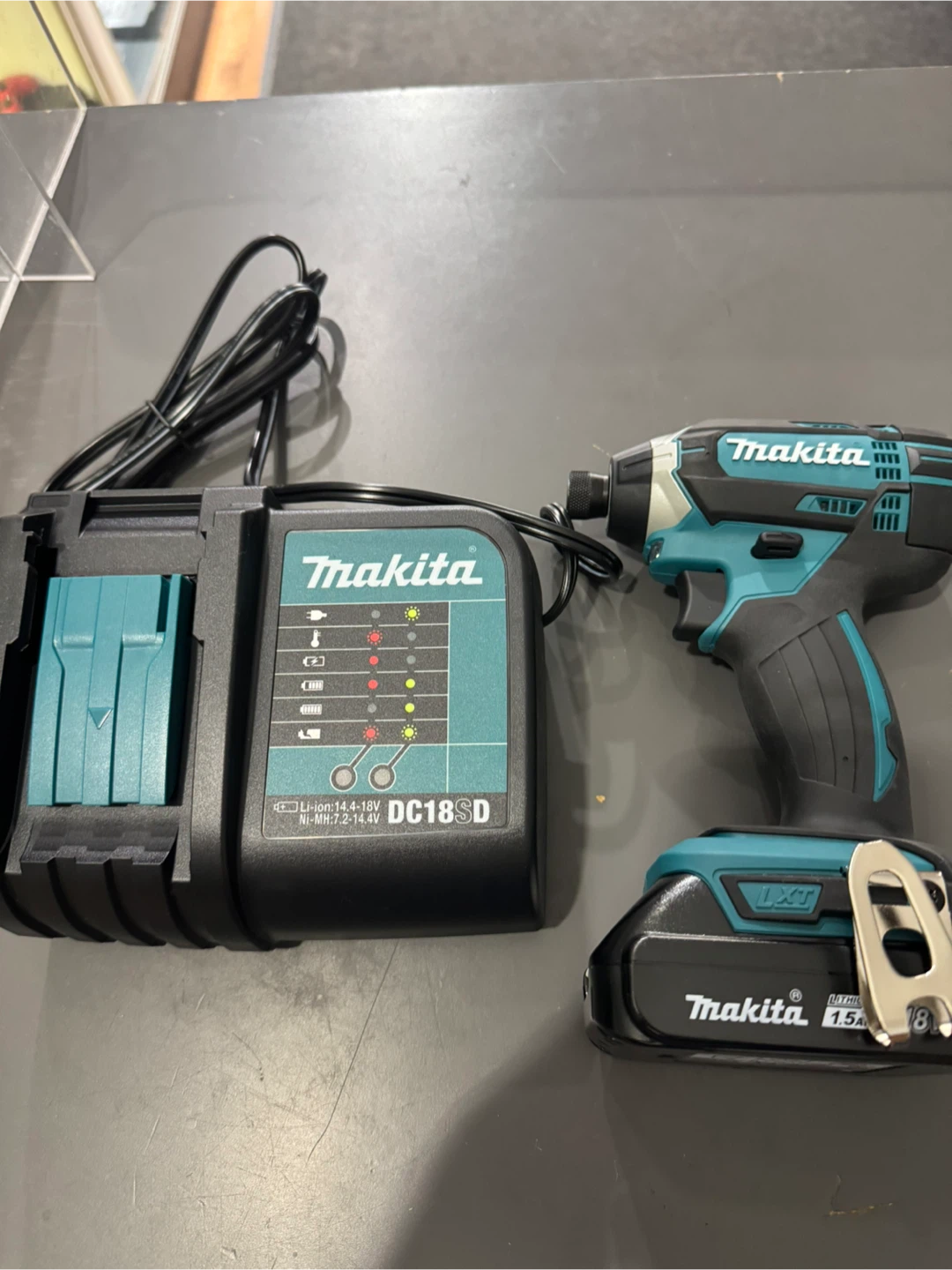 Makita DTD152 Impact Driver with DC18SD Charger & Battery