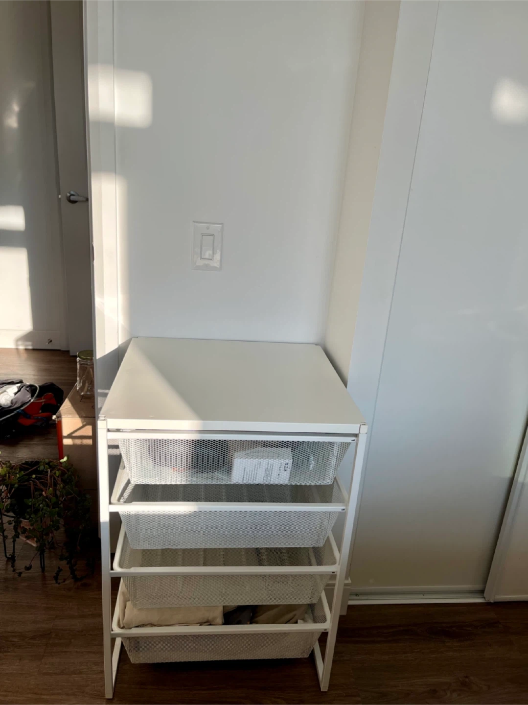 IKEA Jonaxel storage unit with four mesh baskets