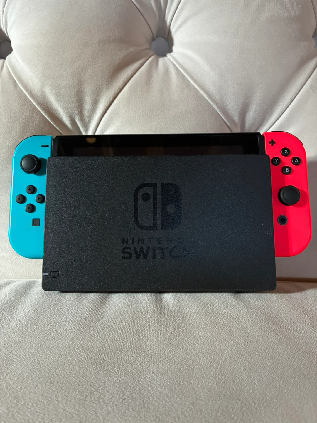 Nintendo Switch Console with Neon Blue and Red Joy-Cons