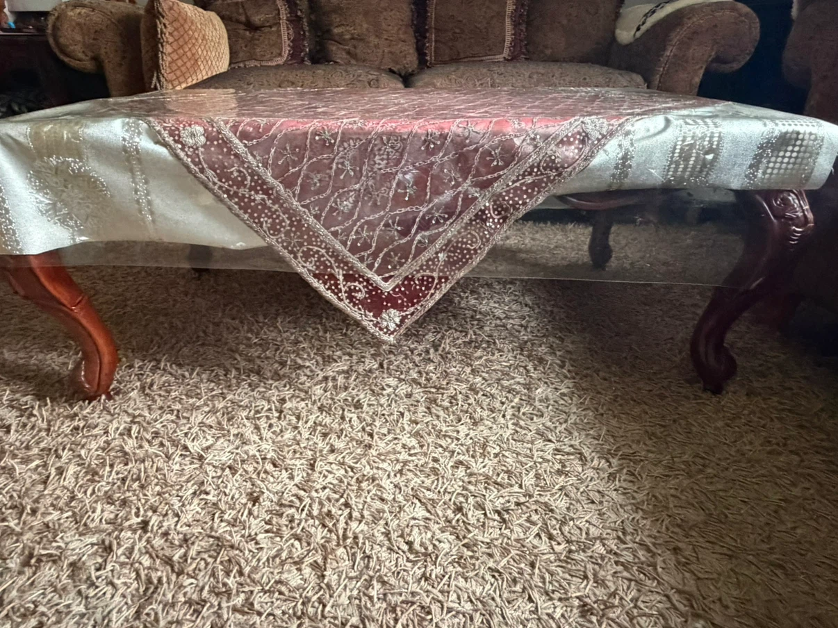 Brown table and table cloth included