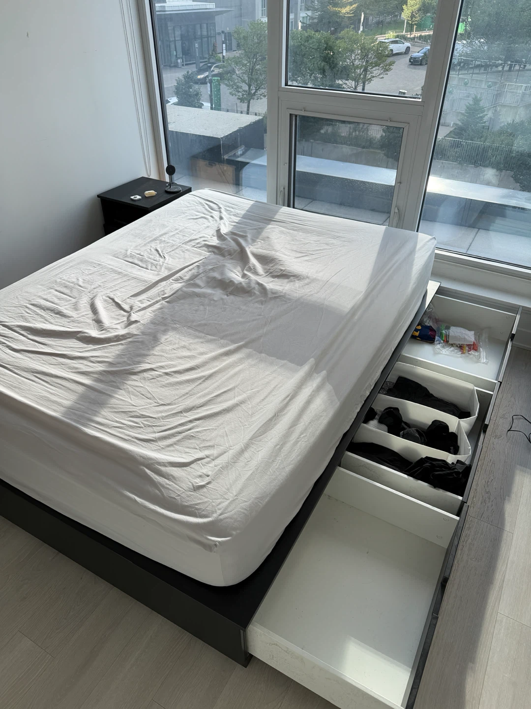 Black bed frame with storage drawers