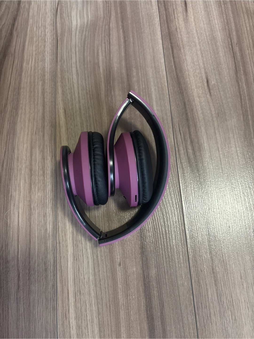 PowerLocus purple over-ear headphones
