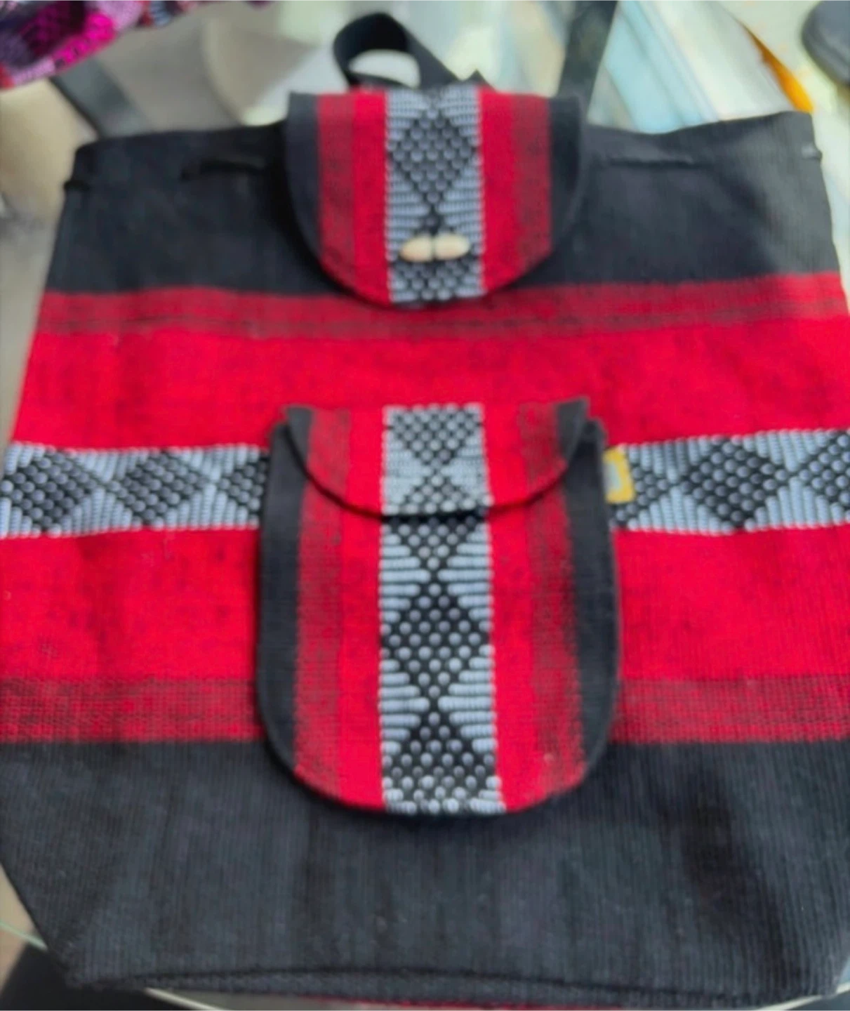 Woven Backpack with Red, Black, and Gray Pattern