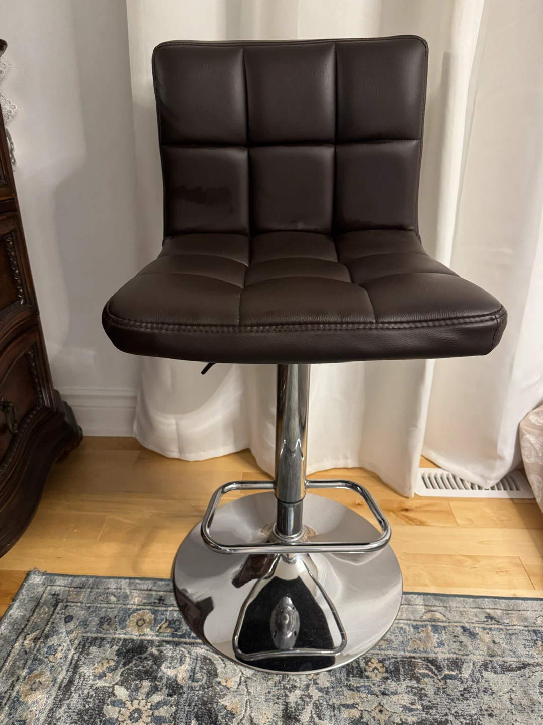 Brown faux leather swivel bar stool