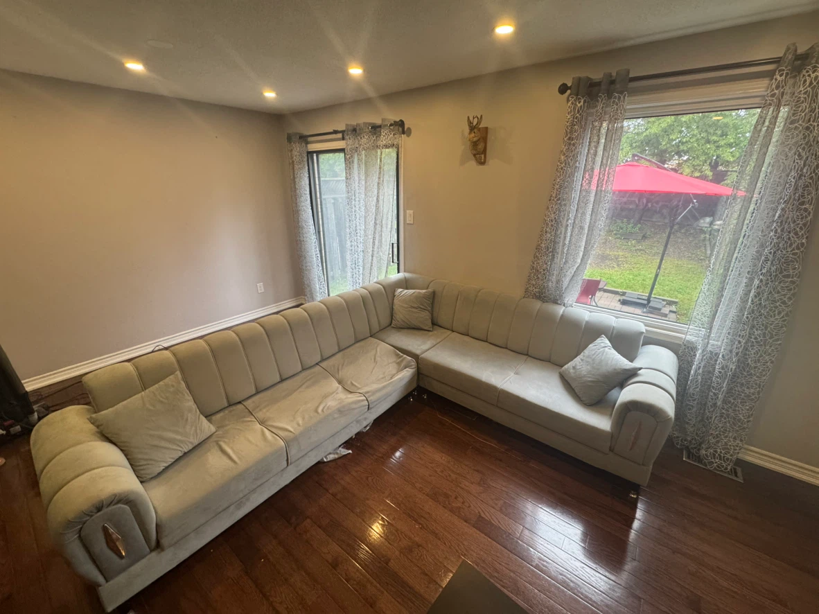 Light Grey Sectional Sofa with Pillows