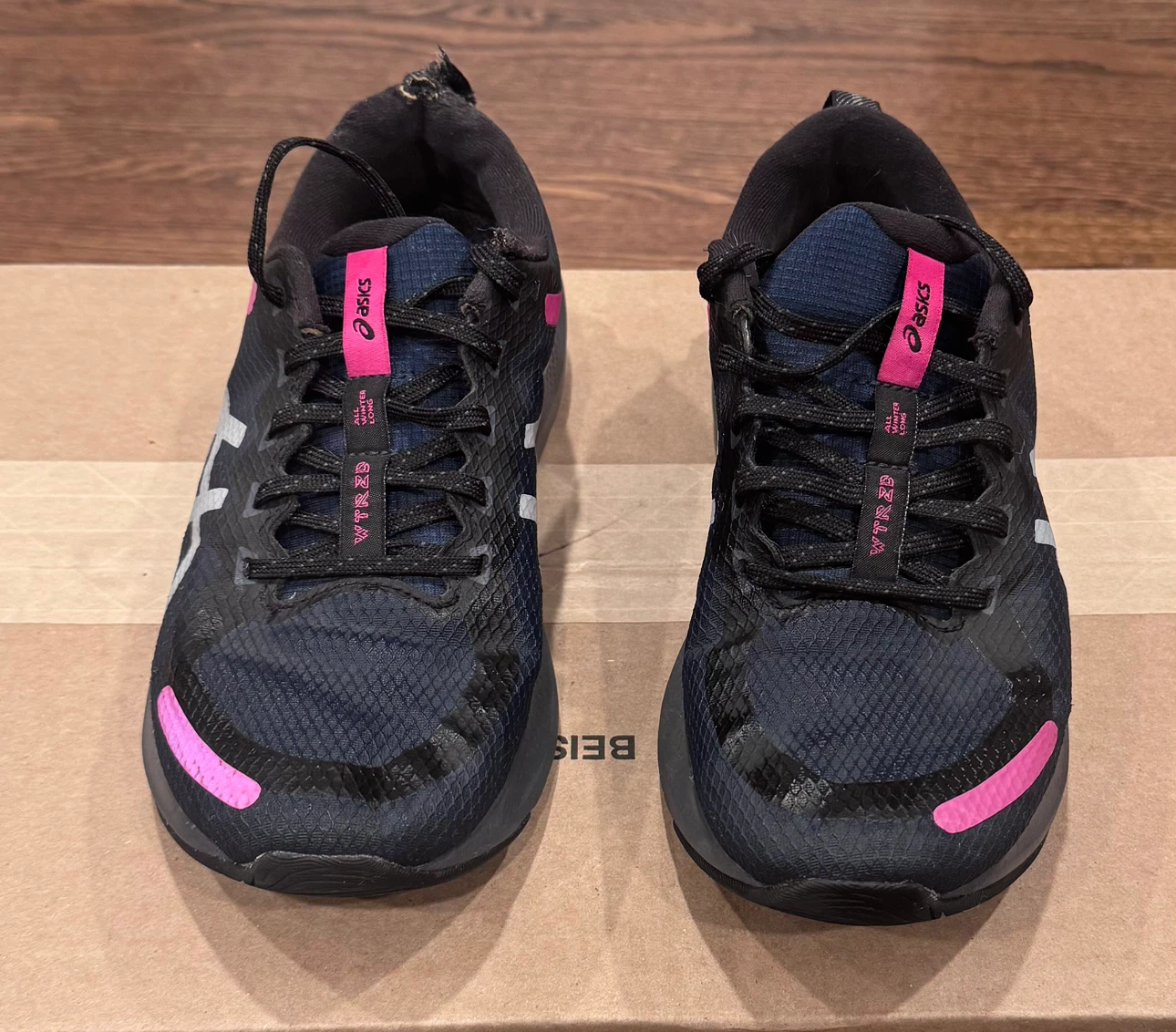 ASICS WTR 2D running shoes in black and pink