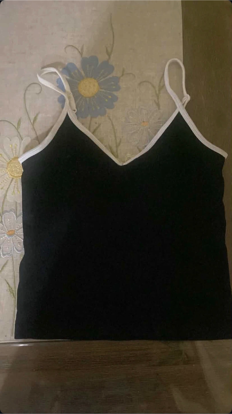 Black tank top with white trim