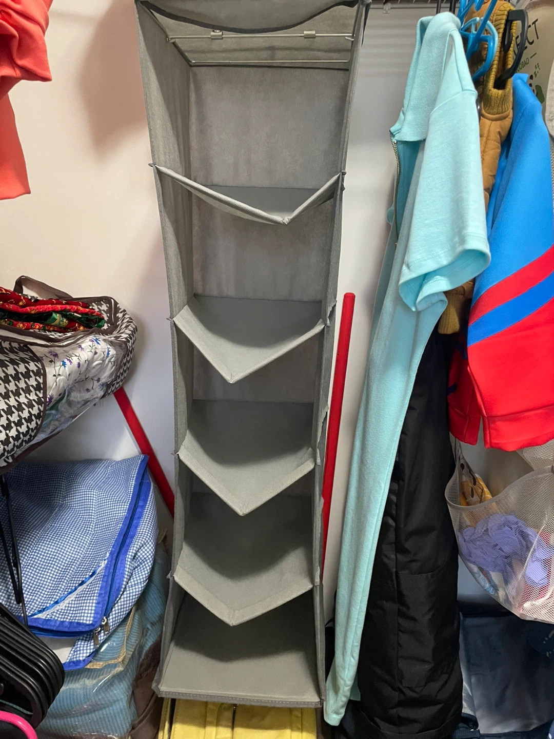 Grey hanging closet organizer with 5 shelves