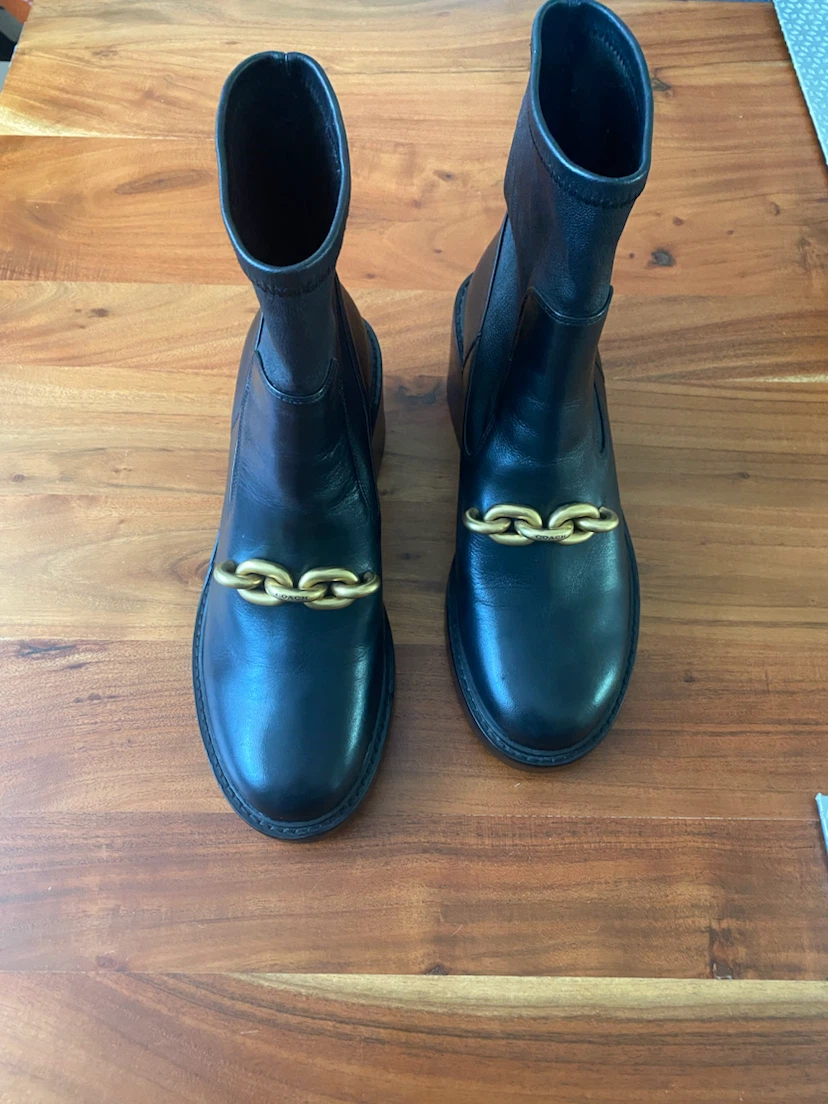 COACH Black Leather Chelsea Boots with Gold Chain Detail
