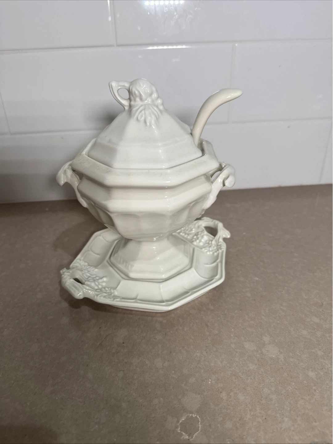 Red Cliff white iron gravy boat with a grape motif, and ladle.