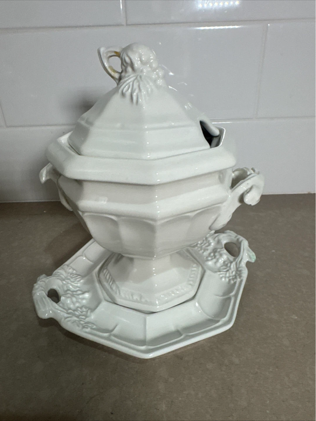 Red Cliff white enameled iron gravy boat with a grape motif.