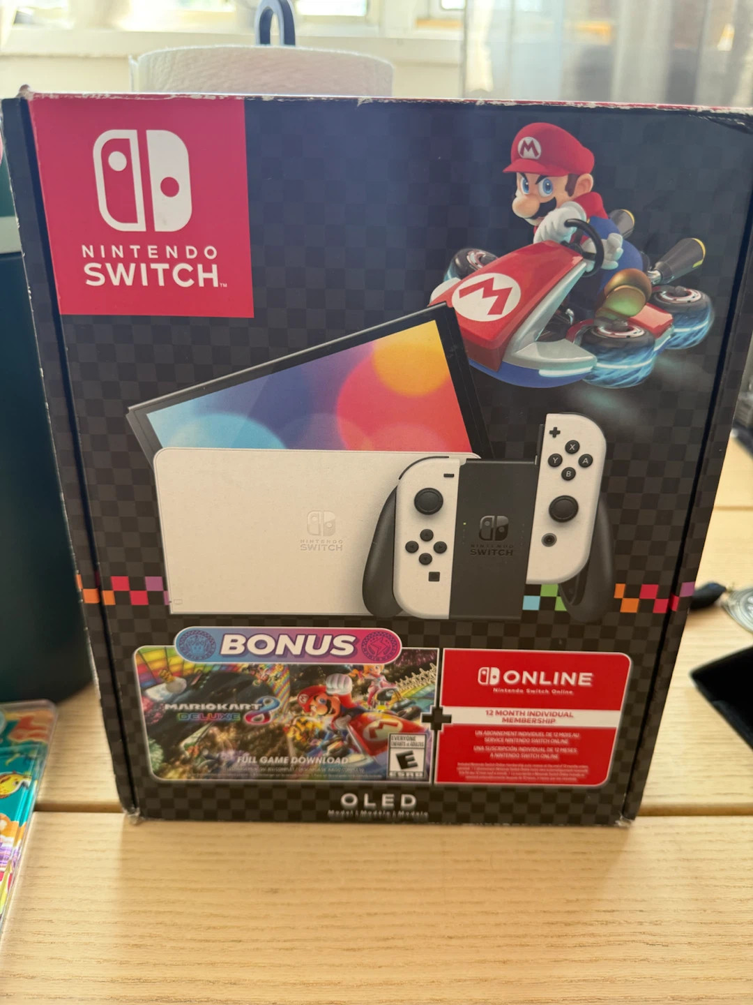 Nintendo Switch OLED w/ Mario Kart 8 and 1-Year Switch Online.