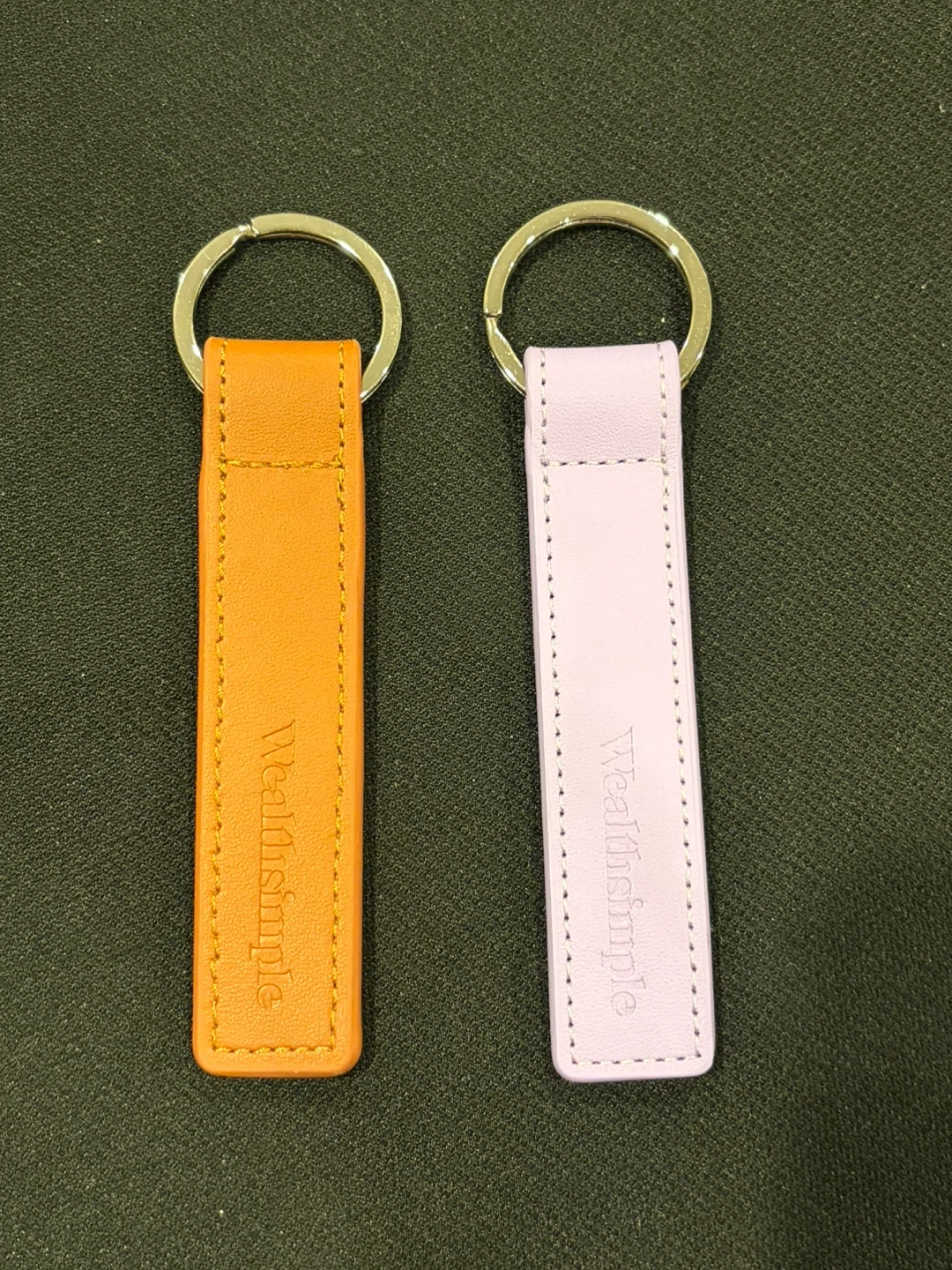 Brand new Wealthsimple Leather Keychains - Orange and Pink