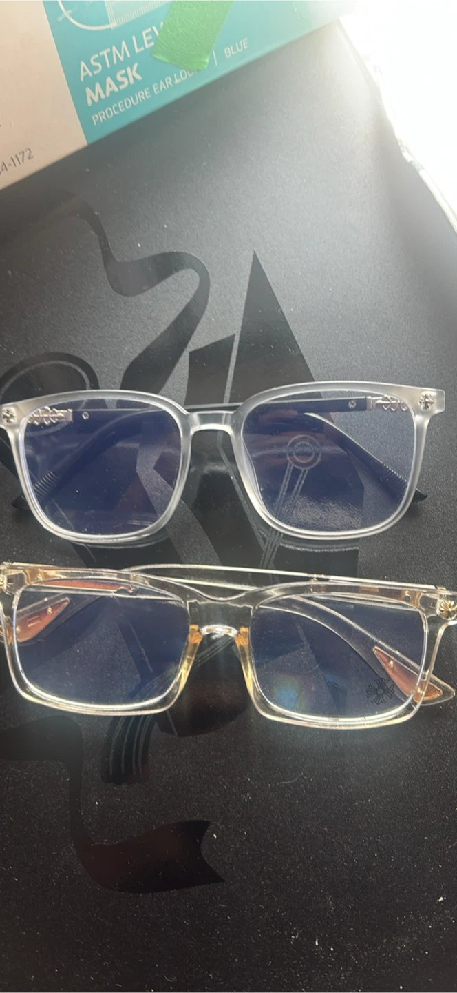 Two clear chrome heart glasses