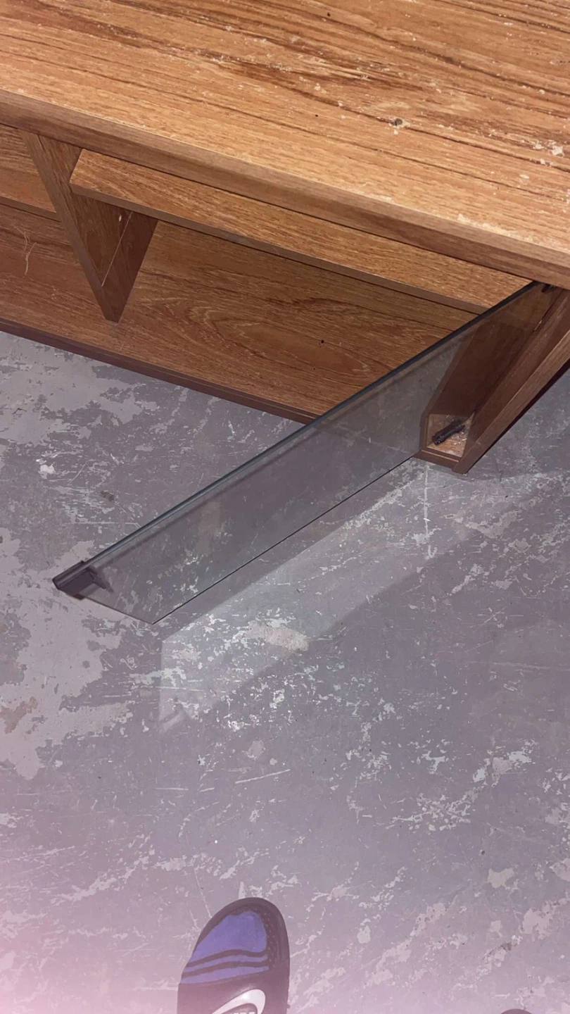 Wooden TV stand with glass door It has wheels too - photo 4