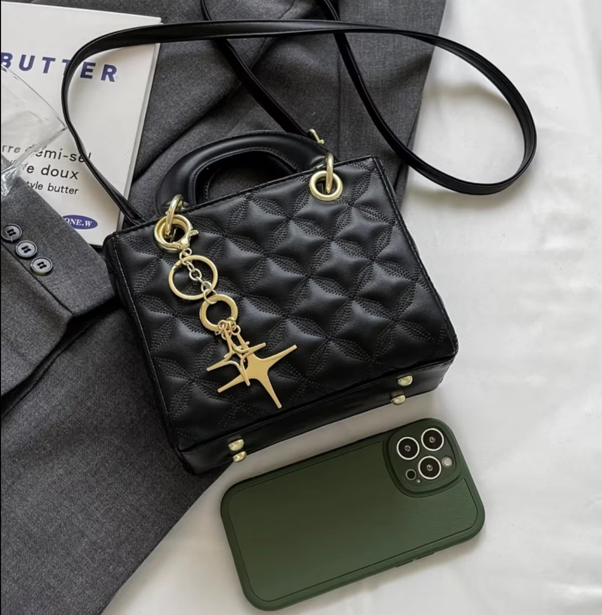 Black quilted handbag with gold hardware - photo 2