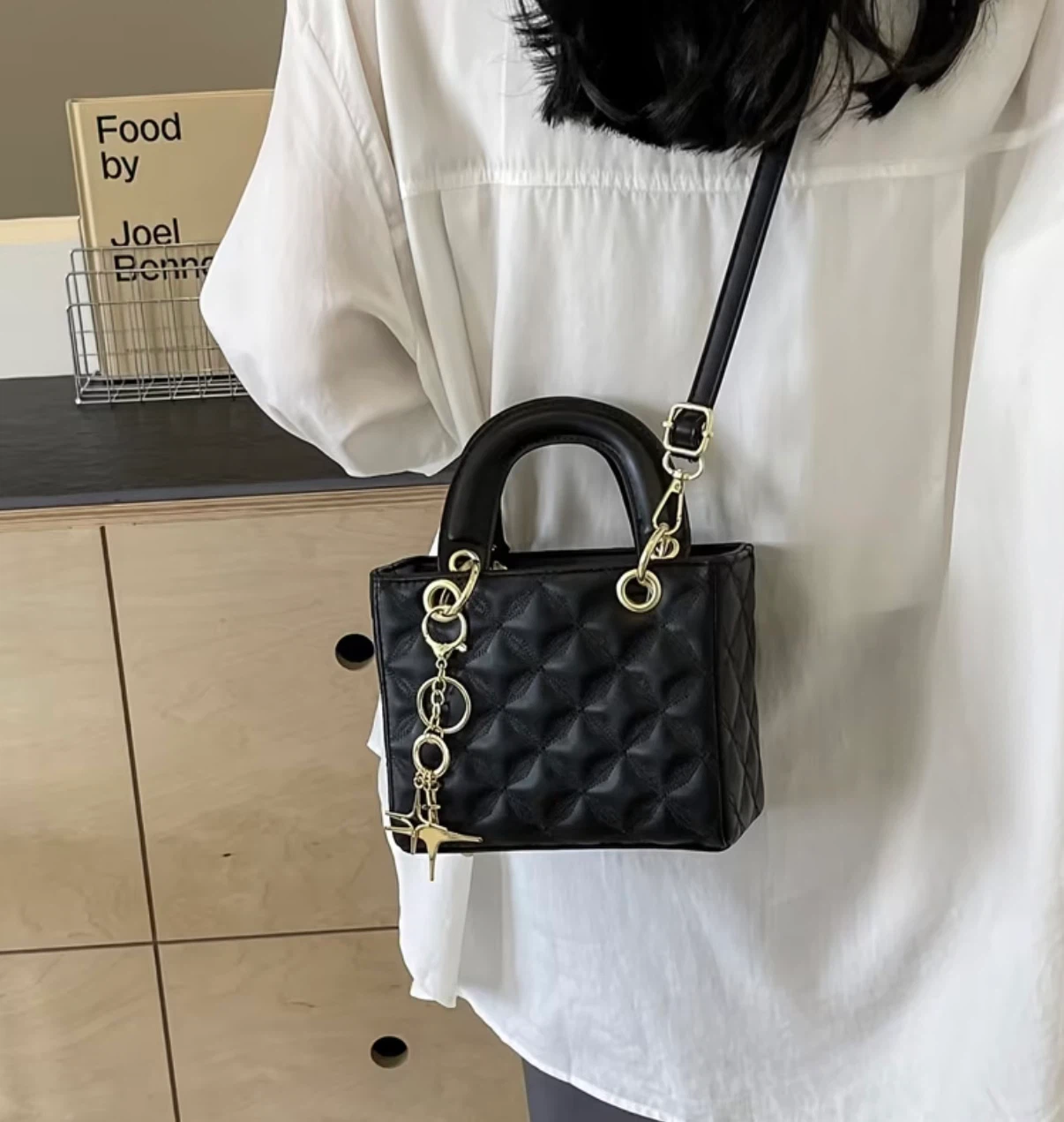 Black quilted handbag with gold hardware - photo 3