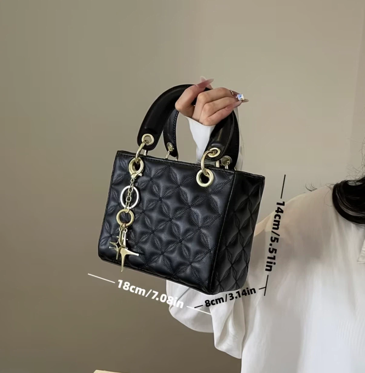 Black quilted handbag with gold hardware - photo 4