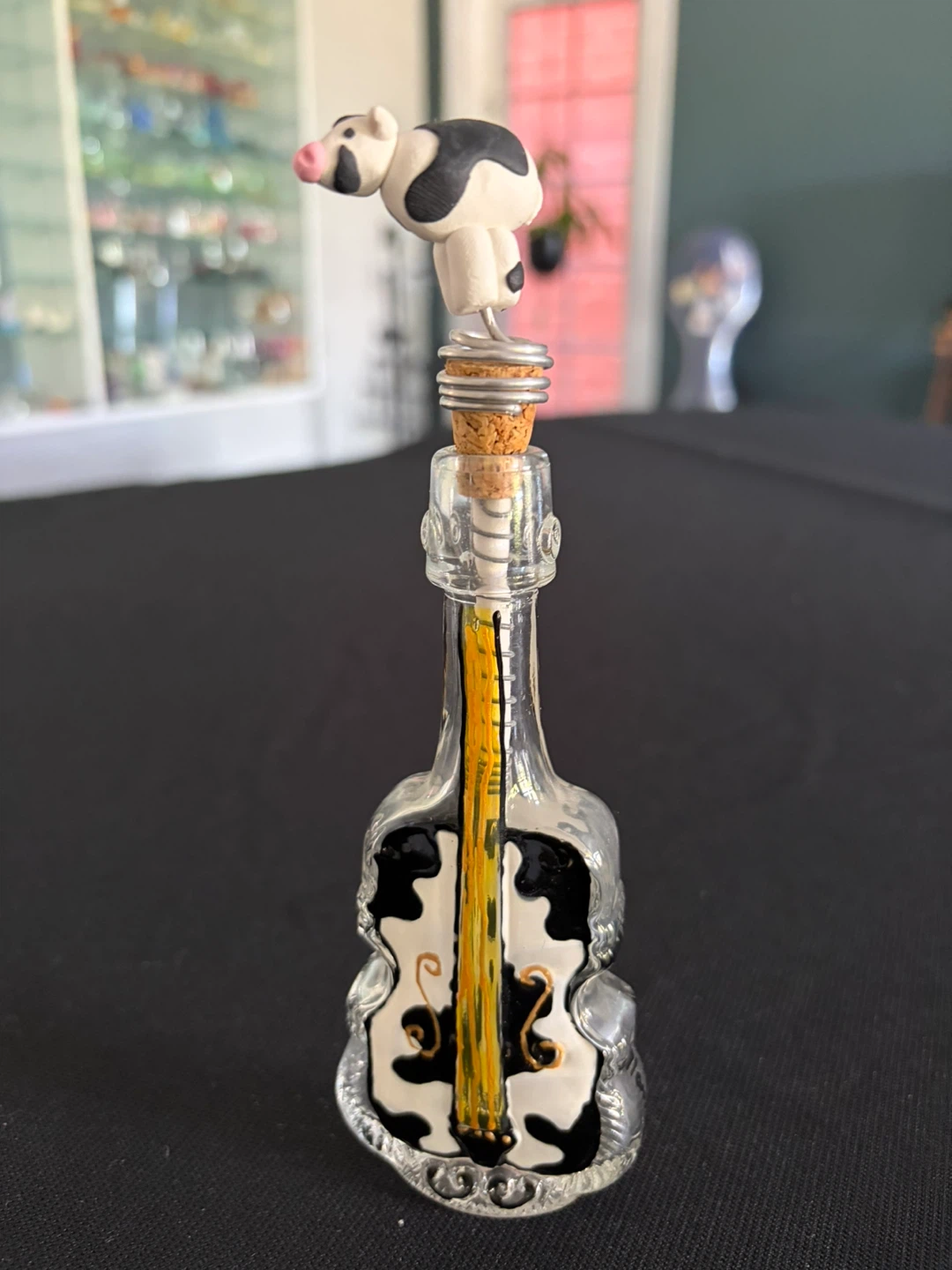 Handmade one of a kind Glass cello Bottle with Cow Topper