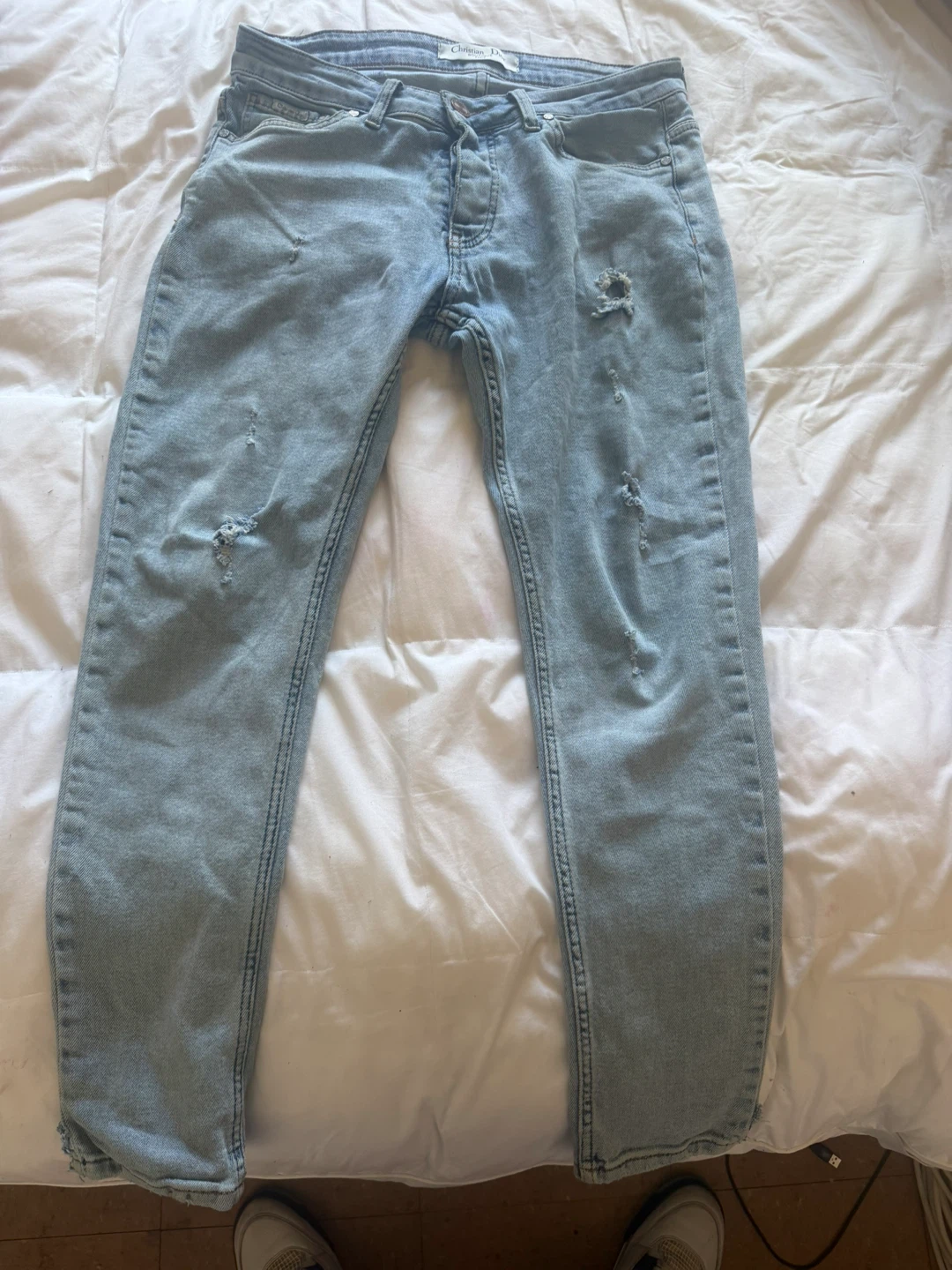 Christian Dior Light Wash Distressed Jeans