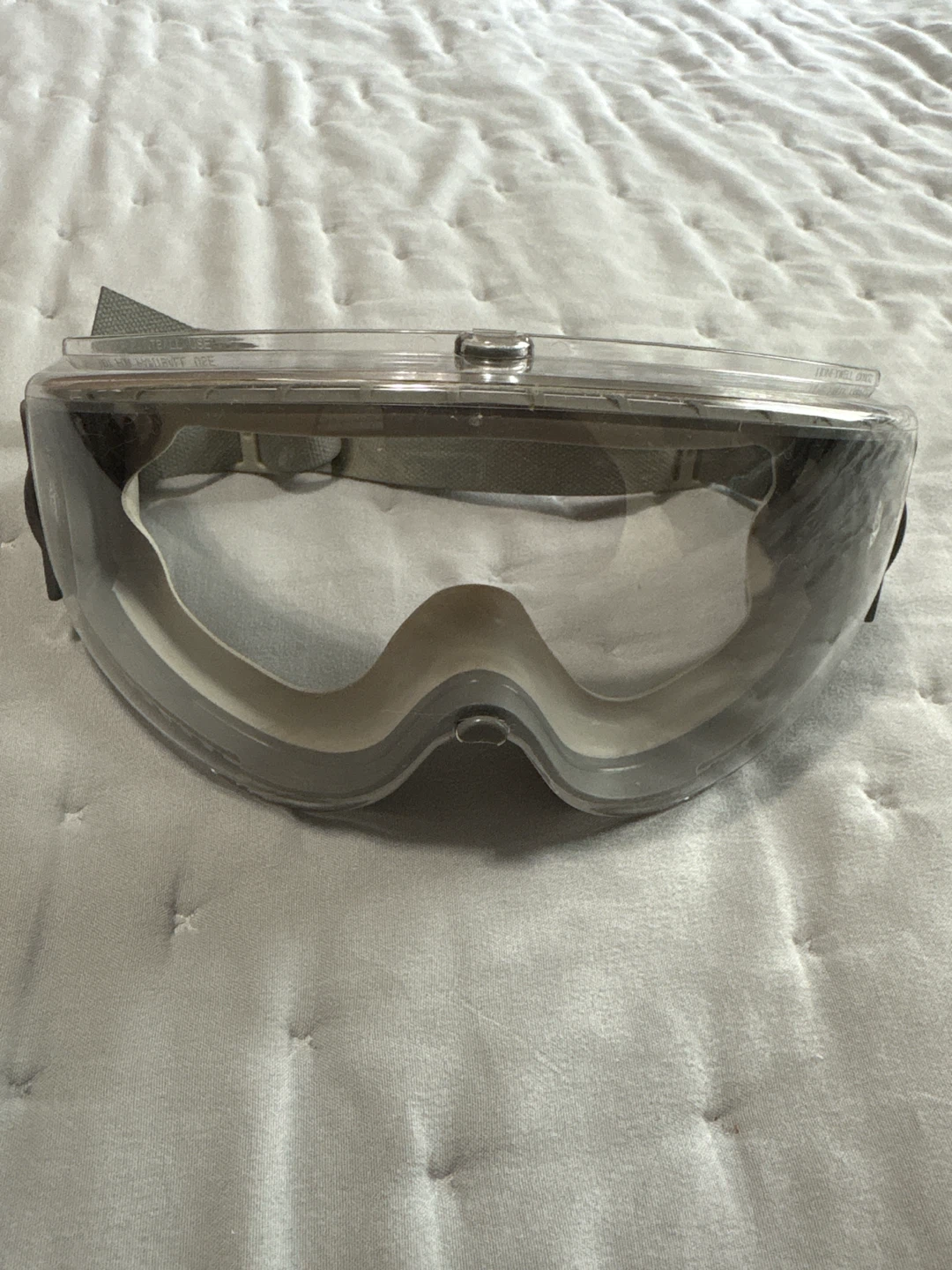 Clear safety goggles with adjustable strap