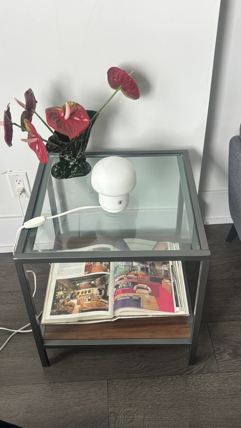 Glass side table with a brown wooden base shelf - photo 2