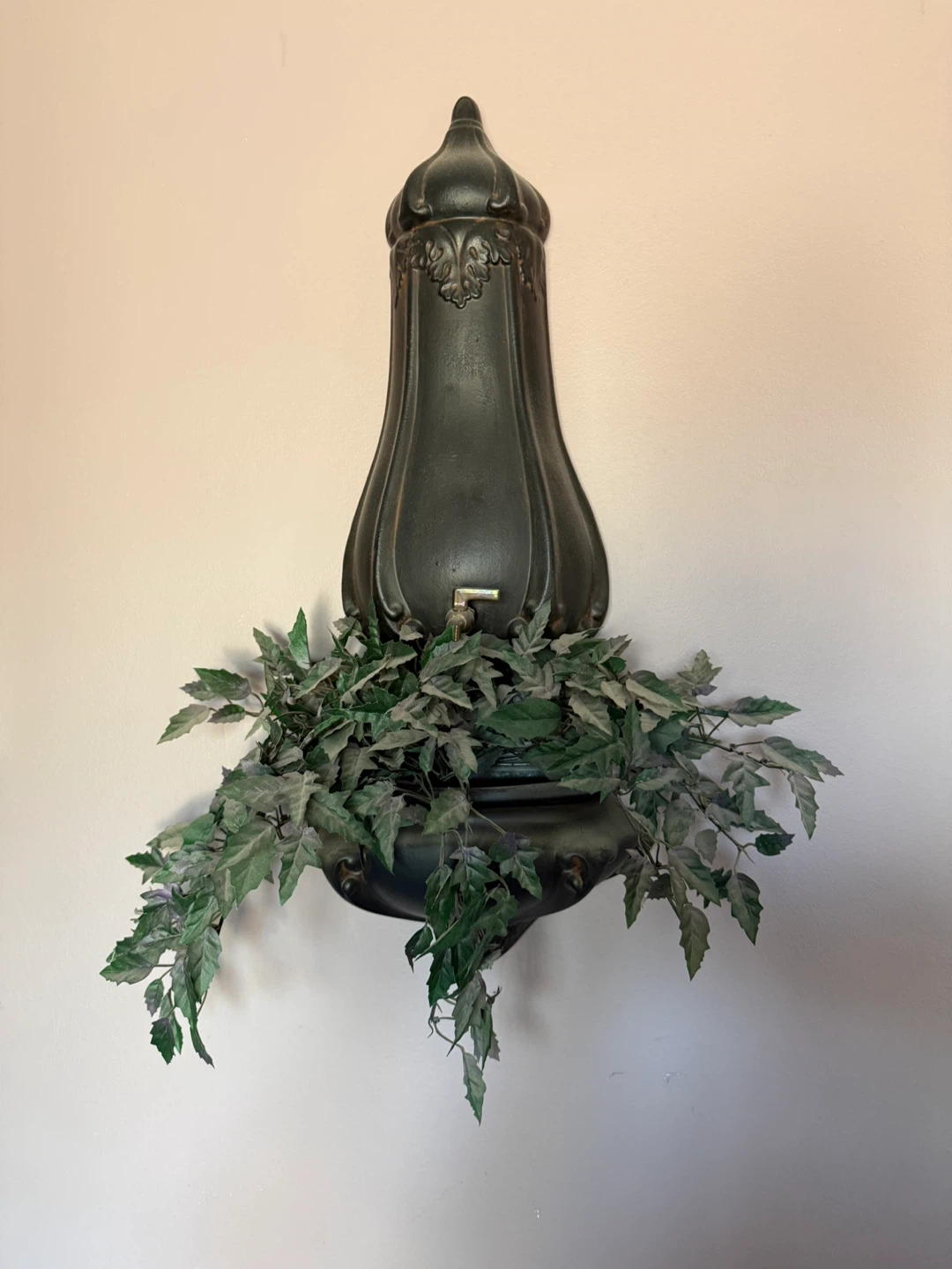 Ornate Wall-Mounted Planter with Faux Greenery
