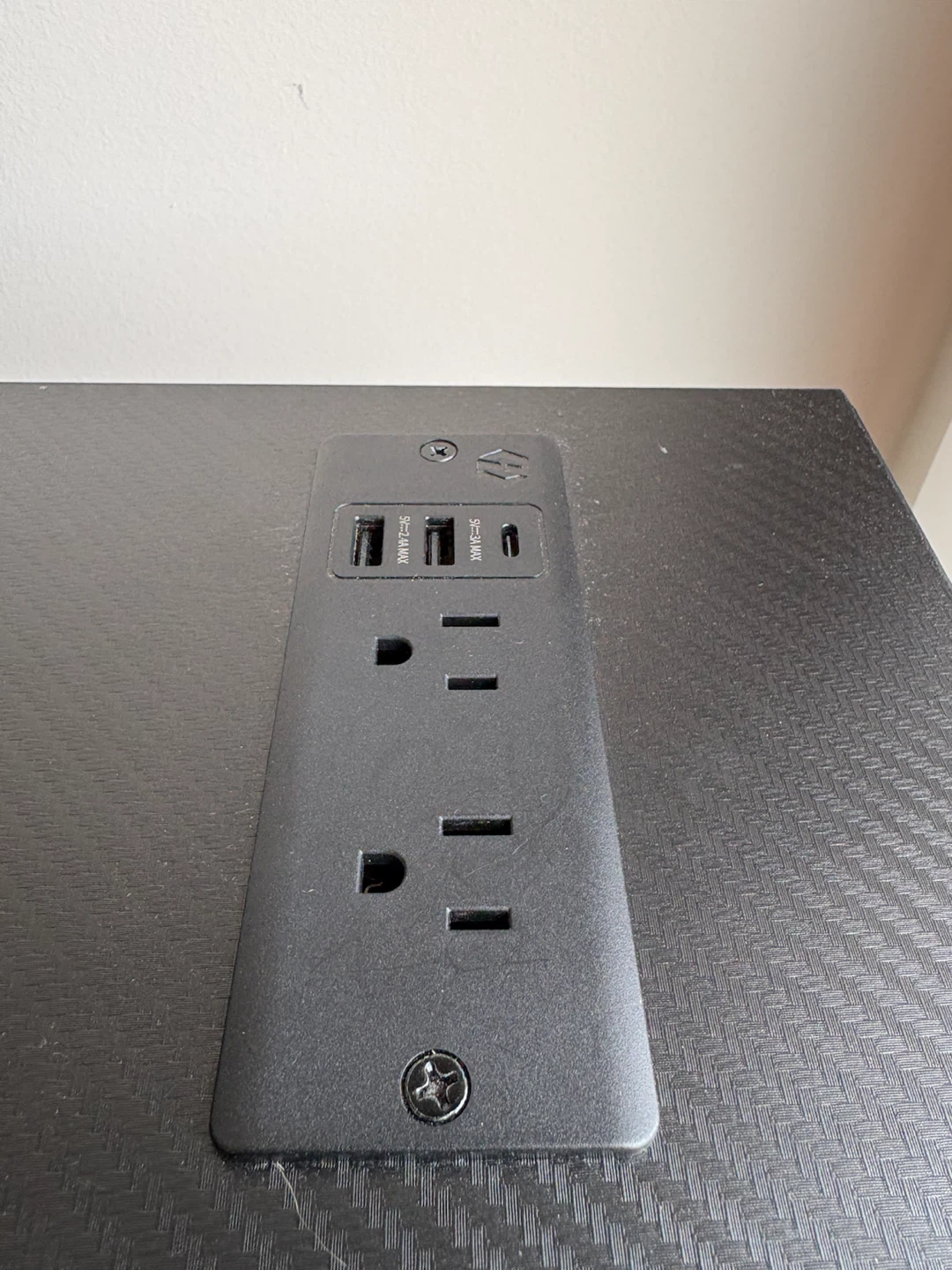 Black Gaming Desk with Monitor Riser and Built-in Power Strip