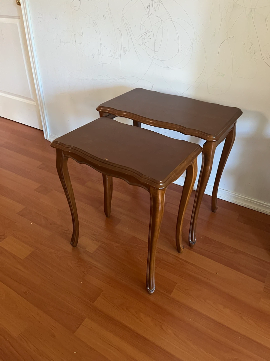 Set of 2 nesting end tables in brown wood finish